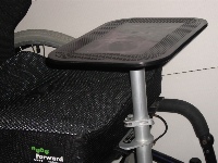 Photo of flat multi-table on wheelchair